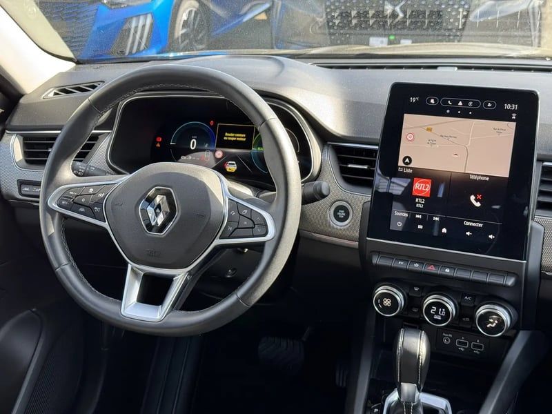 Photo de la voiture RENAULT ARKANA E-Tech hybride 145 - 22 Techno